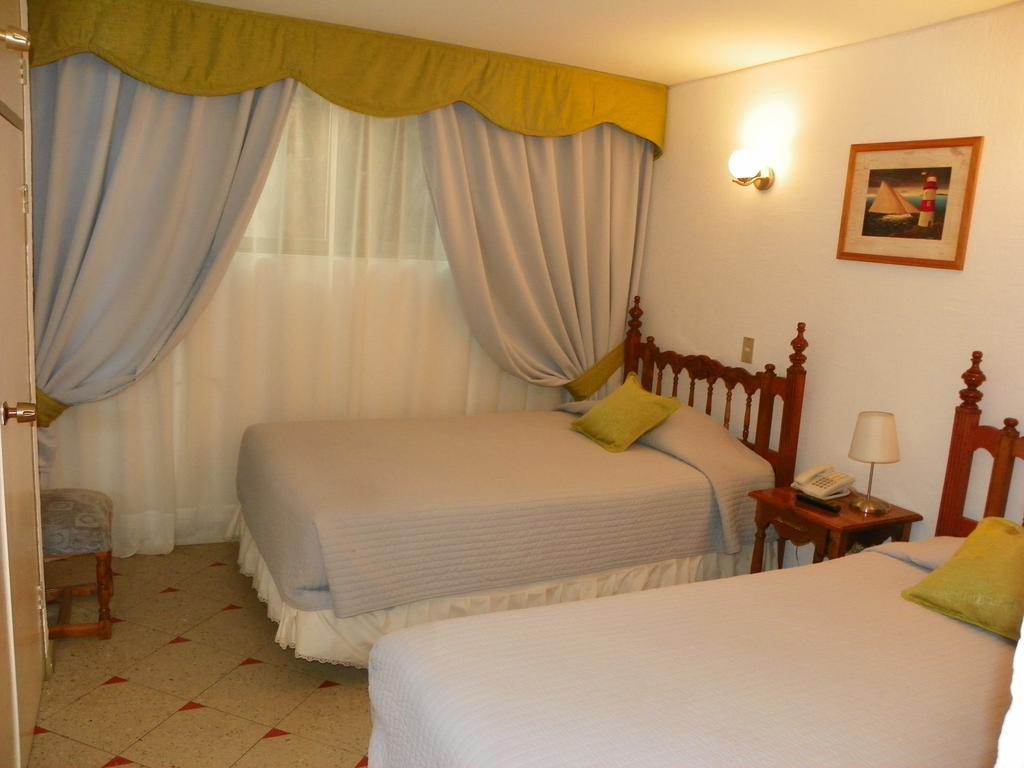 Hotel Savona Arica Rum bild